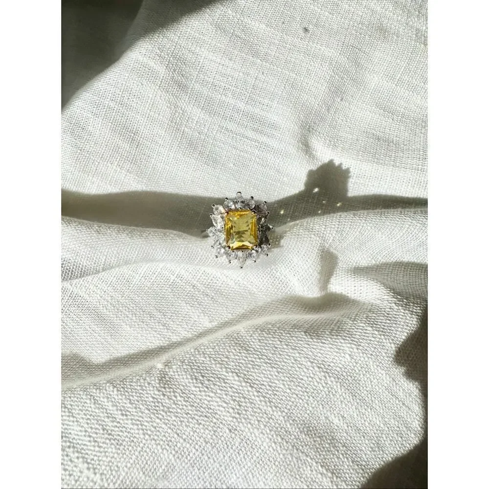 Yellow elongated radiant cut canary cubic zirconia cocktail ring
